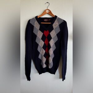 Navy Argyle V-Neck Sweater with Red Accent